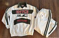 Full tracksuit laid out showing jacket and pants front