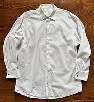 Full view of front showing shirt style, buttons, cuffs, overall condition