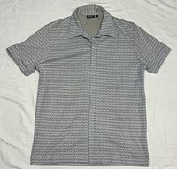 Full front view of the Mexx short-sleeve shirt laid flat