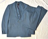 Jacket, vest and pants laid out together