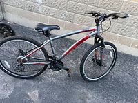 Full left-side view of entire bicycle showing frame, wheels, fork, saddle, handlebars