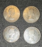 Obverse of four 1964 Canadian 50-cent coins