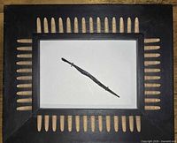 Framed display showing full tool and frame design