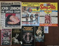 Group shot of all seven items showing covers