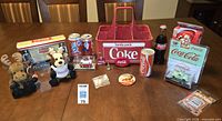 Full lot overview on table showing all Coca-Cola items