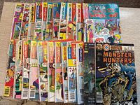 All 22 comics laid out in two rows, titles and cover art visible