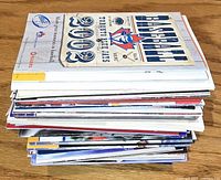 Stack of assorted sports schedules showing top item Toronto Blue Jays 2000 schedule
