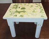 Stool front view, showing overall form and paint color