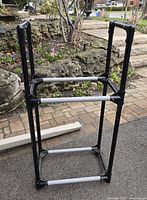 Full view of upright 2-level rack outdoors