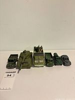 Front view of all six Dinky army vehicles lined up