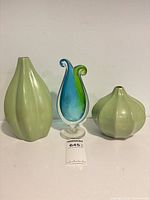 Front view of the three bud vases together