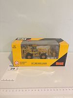 Front view of boxed CAT 988H model