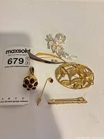 Group shot of six jewellery items