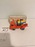 Toy cement mixer and box front view with lot card