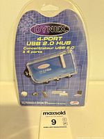 Front of sealed Dynex 4-port USB 2.0 hub package