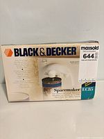 Front of boxed Black & Decker Spacemaker EC85 can opener
