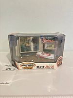 Front view of boxed Matchbox Elvis diorama set