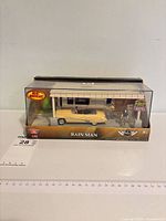 Front view of Motor Max Rain Man 1:43 Buick Roadmaster set in boxed acrylic display