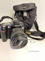 Full kit: camera with lens, strap, bag