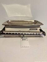 Front view showing Soehnle scale, dial up to 12 kg, stainless tray attached