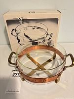 Complete bowl and stand in front of original box