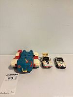 All three Transformers vehicles side by side