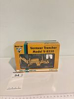 Front view of boxed Vermeer V-8550 trencher model