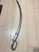 Full view of sword on floor