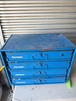 Front view of blue Fastenal 4-drawer cabinet