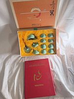 Closed presentation box and red commemorative cover