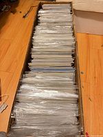 Top view of long box filled with bagged comics