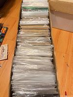 Top view of long box filled with bagged comic books