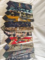 All ties laid out showing patterns and labels