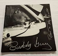 Front cover showing Buddy Guy close-up on guitar, album title and signature