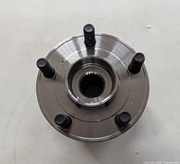 Top view showing five studs and splined bore