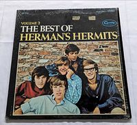 Front sleeve showing album title and band photo