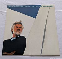 Front album cover showing Kenny Rogers portrait and title