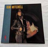 Front jacket showing album art and title