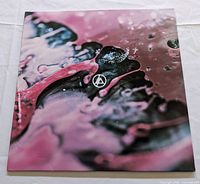 Front cover of Linkin Park From Zero LP with abstract pink artwork