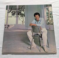 Front album jacket showing title and artist