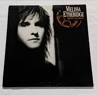 Front album jacket showing Melissa Etheridge portrait and title