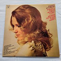 Front album cover displaying title and artist