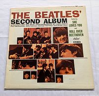 Front sleeve displaying title and images of band members