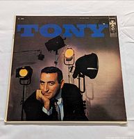 Front album jacket showing title and artist