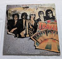 Front jacket showing Travelling Wilburys artwork