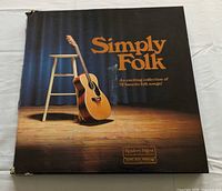 Front of Simply Folk box set with guitar image
