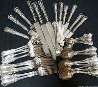 Assorted Francis 1 knives, forks and spoons fanned out