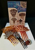 Whole lot showing book and five combs