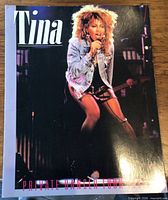Front cover showing Tina Turner on stage, title text 'Tina' and 'Private Dancer Tour'