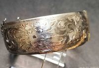 Floral etched front of sterling bangle